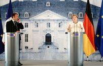 German Chancellor Angela Merkel and French President Emmanuel Macron meet at Meseberg castle