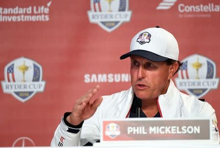 Sep 28, 2016; Chaska, MN, USA; Team USA player Phil Mickelson Matt Kuchar Brandt Snedeker address the media before their practice round for the 41st Ryder Cup at Hazeltine National Golf Club. Mandatory Credit: John David Mercer-USA TODAY Sports