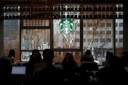 A Starbucks logo is seen at a Starbucks coffee shop in Seoul, South Korea, March 7, 2016. Picture taken March 7, 2016. REUTERS/Kim Hong-Ji