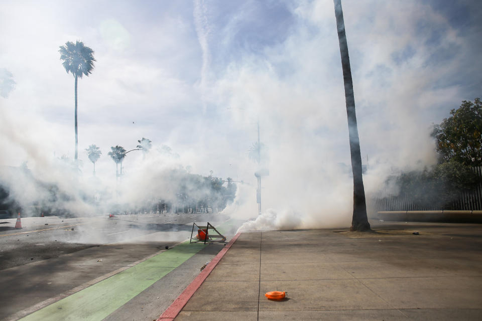 Tear gas looms over Ocean Avenue near the California Incline (Stanton Sharpe / Getty Images)