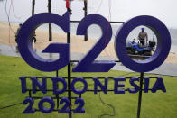 A police officer prepares an ATV for patrol ahead of the G20 Foreign Ministers' Meeting in Nusa Dua, Bali, Indonesia, Thursday, July 7, 2022. Foreign ministers from the Group of 20 leading rich and developing nations are gathering in Indonesia's resort island of Bali for talks bound to be dominated by the conflict in Ukraine despite an agenda focused on global cooperation and food and energy security. (AP Photo/Dita Alangkara)