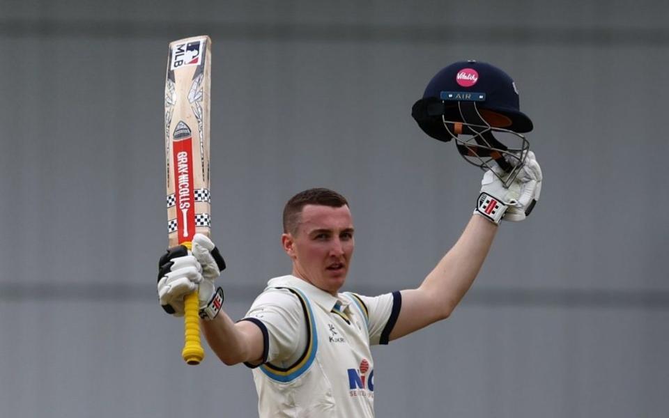 Harry Brook raising his bat - Harry Brook smashes century from 69 balls on return to cricket