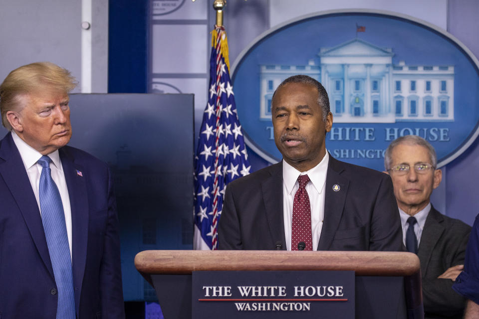 President Trump listens to U.S. Housing and Urban Development Secretary Ben Carson speak during a briefing in the James Brady Press Briefing Room at the White House. (Photo by Tasos Katopodis/Getty Images)