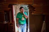 <p>Construction worker Antonio Barros, 54, stands inside of what remains of his house at Vila Autodromo, near the Olympic Park in Rio de Janeiro, Brazil, Tuesday, June 9, 2015. (AP Photo/Mauro Pimentel)</p>