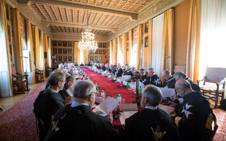 Knights of Malta take part in the secret ballot for a new Grand Master at the order's Villa Magistrale in Rome - Credit: Remo Casilli/Malta Knights via AP