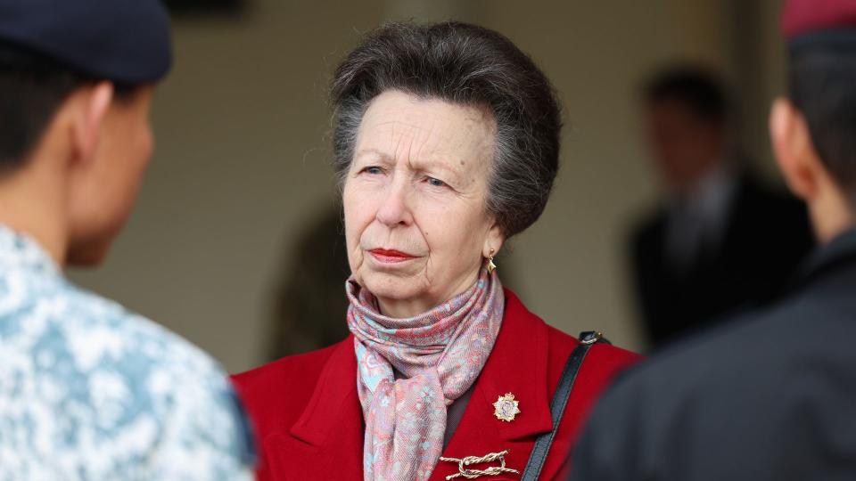 Princess Anne in red coat