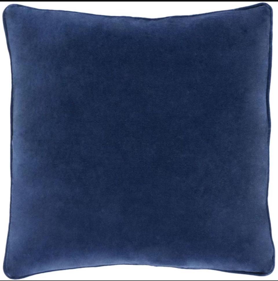 This 18 x 18 square velvet pillow comes in an assortment of jewel tones. <strong><a href="https://fave.co/2ZxqXSJ" target="_blank" rel="noopener noreferrer">Find it for $22 at Joss &amp; Main</a>.</strong>