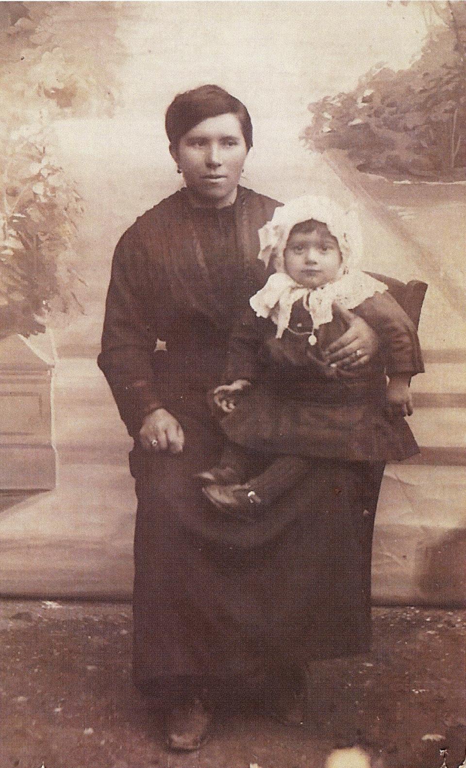 Rosa Moroncelli Bizzocchi (1883-1980) holds her oldest child, Maria Carolina Bizzocchi (1909-2006), in this circa 1909-1910 photo from the Portsmouth Athenaeum's North End Neighborhood Collection.