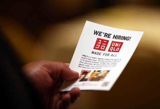 A job seeker holds a flier before meeting with a recruiter during a HIREvent job fair in San Francisco, California in July 2012. With the employment situation stagnant this year -- the jobless rate is stuck at a high 8.3 percent -- the new data for August could say a lot about the strength of the economy, as it weathers a global downturn and a domestic stalemate on economic policy