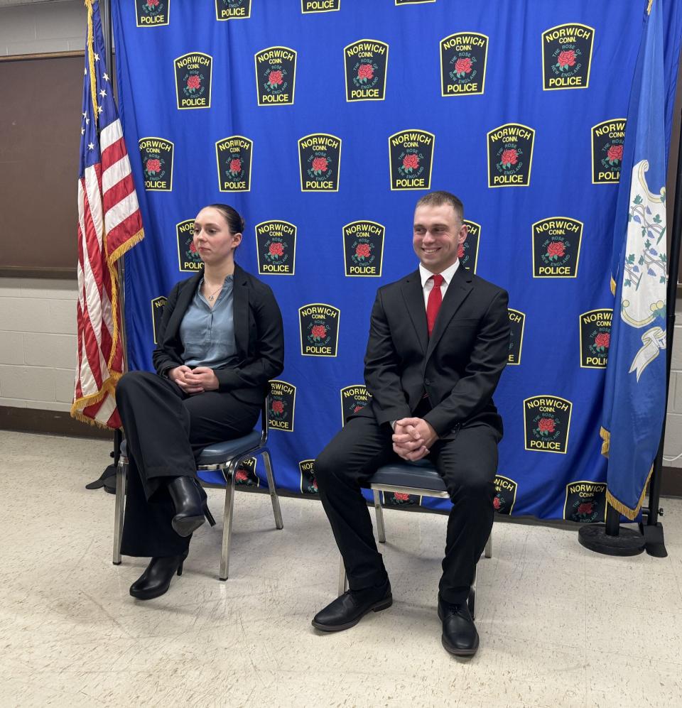 Police officer recruits Alexis Freel and Dylan Beaudoin at their swearing-in ceremony Wednesday.