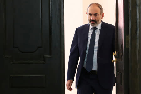 Armenian Prime Minister Nikol Pashinyan enters a hall prior to a cabinet meeting in Yerevan, Armenia October 16, 2018. REUTERS/Hayk Baghdasaryan/Photolure