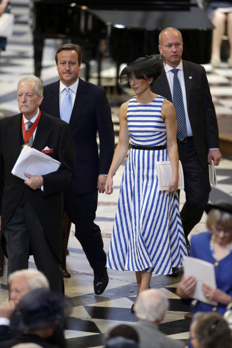 Samantha Cameron in a blue and white striped dress with her husband Prime Minister David Cameron