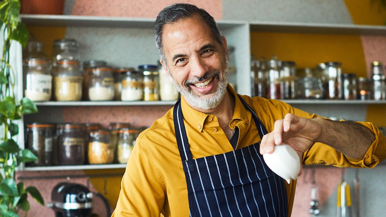  Yotam Ottolenghi at work in the kitchen. 