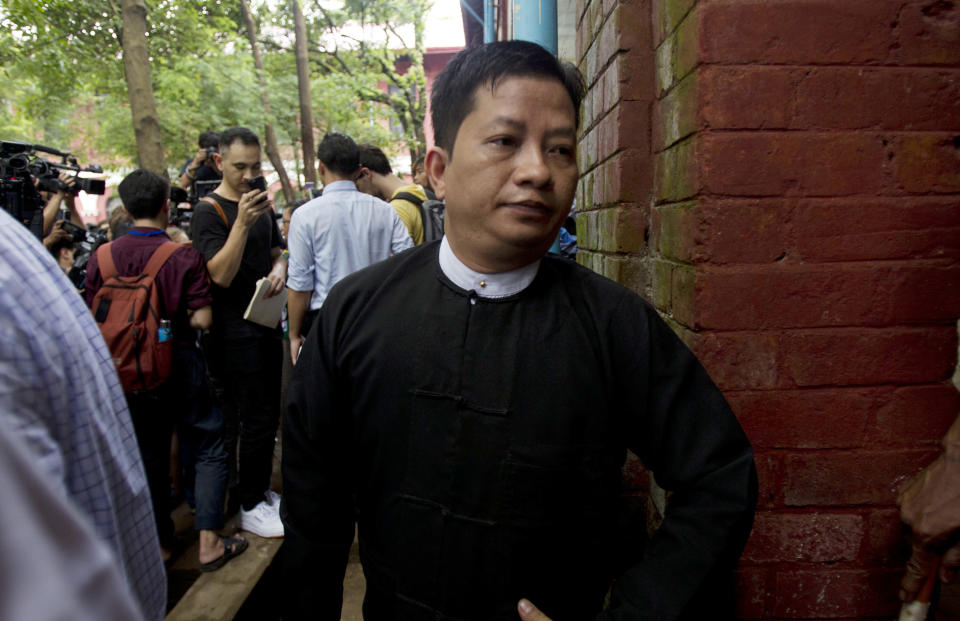 Than Zaw Aung, a lawyer representing the two Reuters journalists, leaves the court after the trial Monday, Sept. 3, 2018, in Yangon, Myanmar. The court sentenced two Reuters journalists to seven years in prison Monday for illegal possession of official documents, a ruling that comes as international criticism mounts over the military's alleged human rights abuses against Rohingya Muslims. (AP Photo/Thein Zaw)