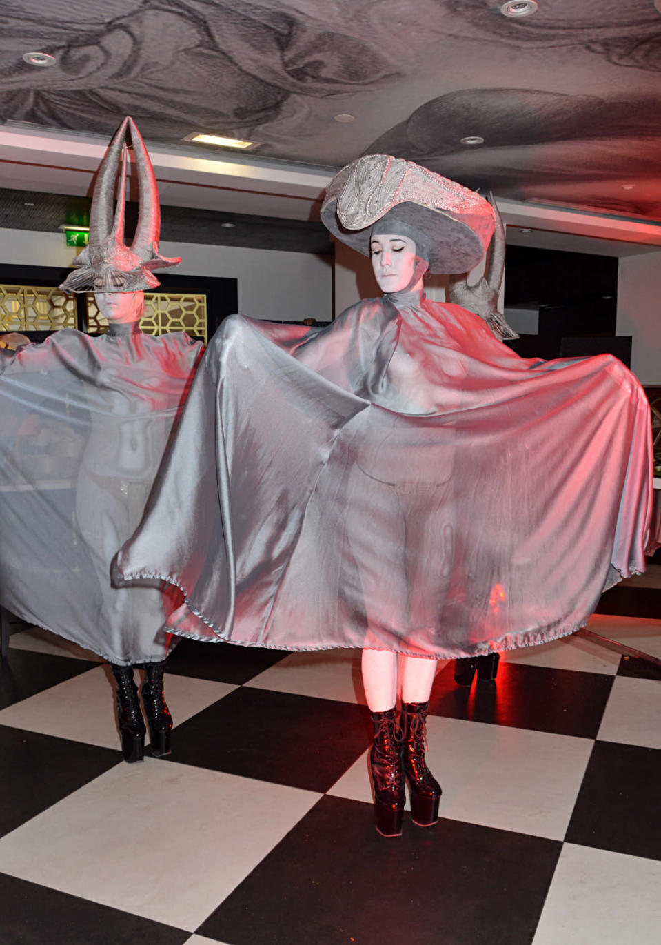 Dancers dressed as cheese gone bad in Alexander Wang-like claw boots. 