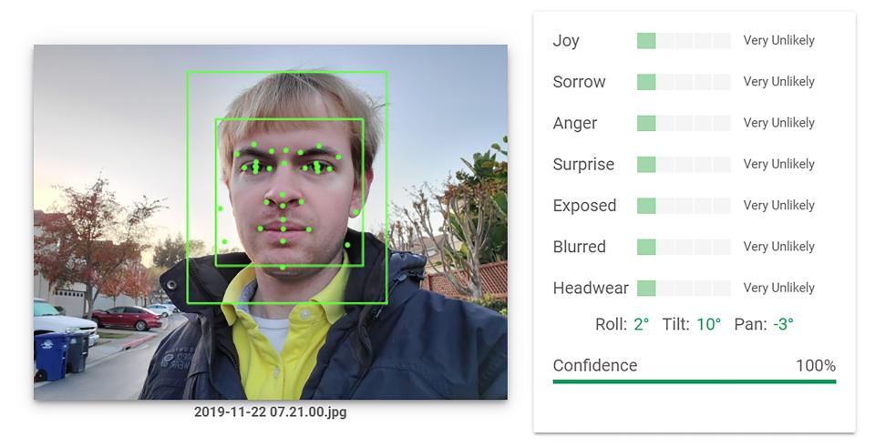 An Artificial Intelligence system from Google Vision, performing Facial Recognition and emotion analysis on a photograph of a man, with facial features identified and facial bounding boxes present, San Ramon, California, November 22, 2019.