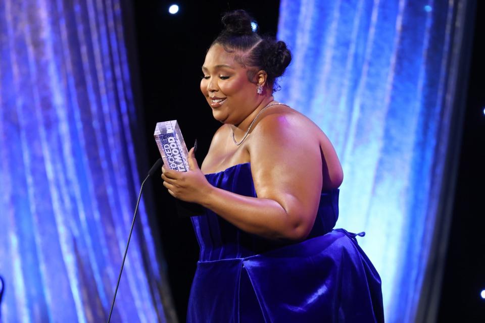 BEVERLY HILLS, CALIFORNIA - JUNE 24: Lizzo speaks on stage during the 2nd annual Hollywood Unlocked Impact Awards at The Beverly Hilton on June 24, 2022 in Beverly Hills, California. (Photo by Randy Shropshire/Getty Images for Hollywood Unlocked)