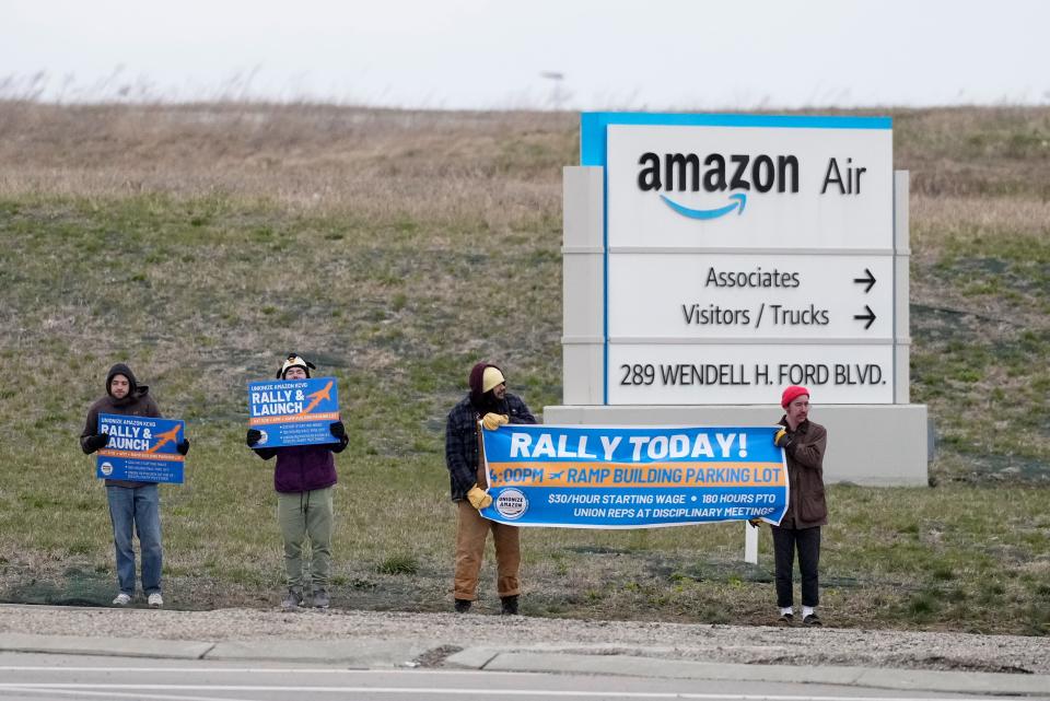 Unionization supporters gather near the Amazon Air - KCVG Sort Hub in Hebron, Ky., on Saturday, March 18, 2023.