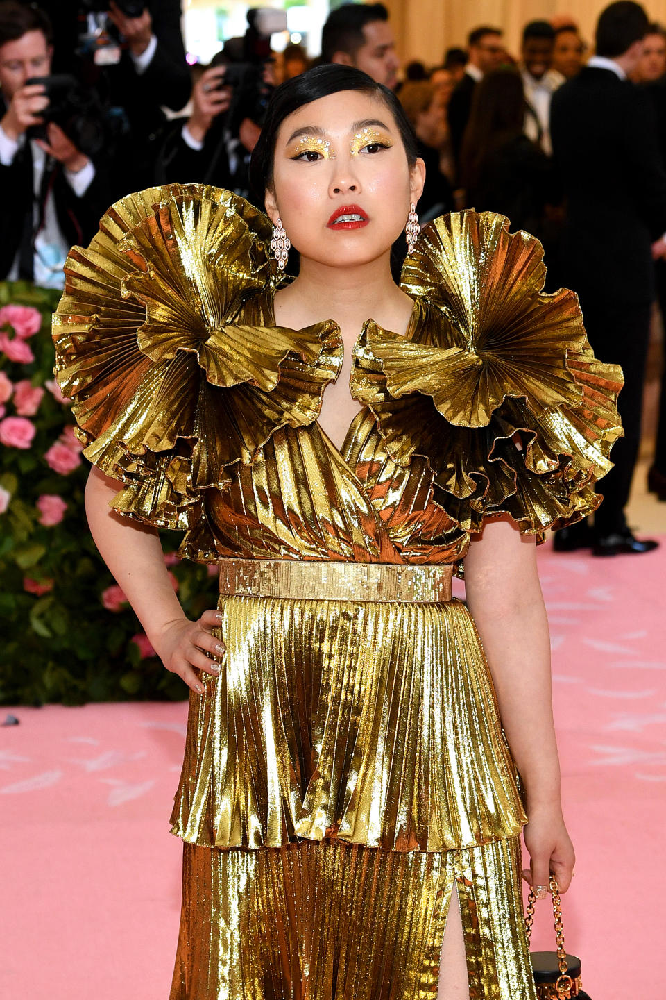 Actress and musician Awkwafina wore iconic Serpenti earrings paired with a Divas’ Dream ring to her Met Gala debut. (Photo by Dimitrios Kambouris/Getty Images for The Met Museum/Vogue)