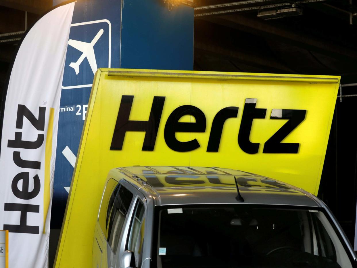 Logos of car rental company Hertz are seen outside Paris Charles de Gaulle airport in Roissy-en-France during the outbreak of the coronavirus disease (COVID-19) in France: REUTERS