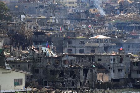 Damaged buildings are seen after government troops cleared the area from pro-Islamic State militant groups inside a war-torn area in Marawi city, southern Philippines October 23, 2017. REUTERS/Romeo Ranoco