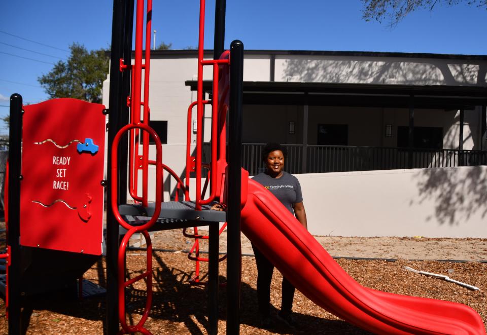 Akili Phillips, development coordinator for Family Promise of Brevard, is pictured on the new playground of the nonprofit's soon-to-be home: the decommissioned Cocoa Fire Station One on 1st Street.