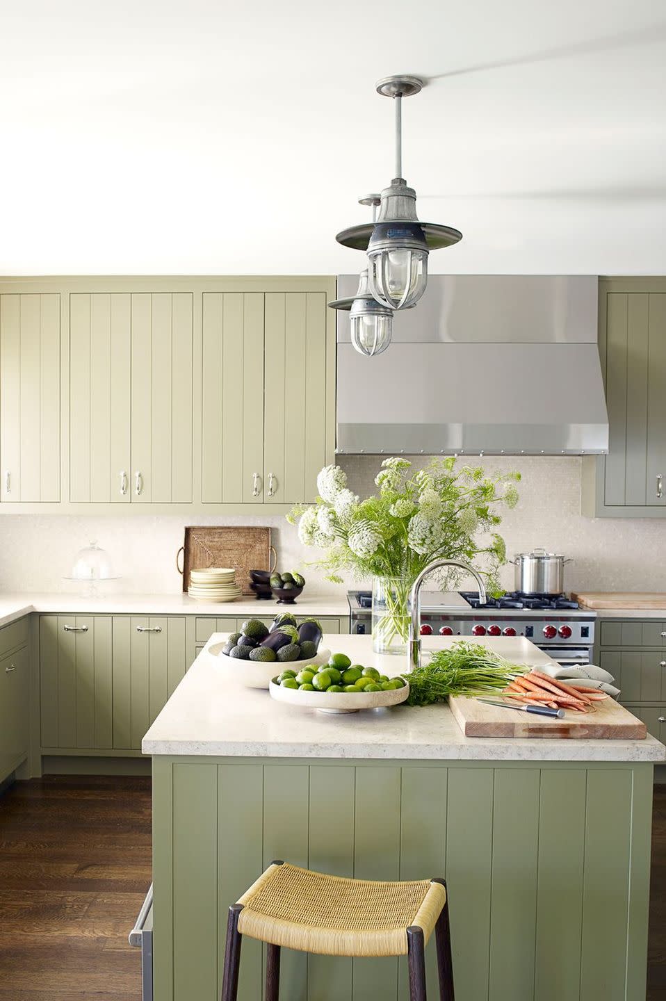 a kitchen with a table and chairs