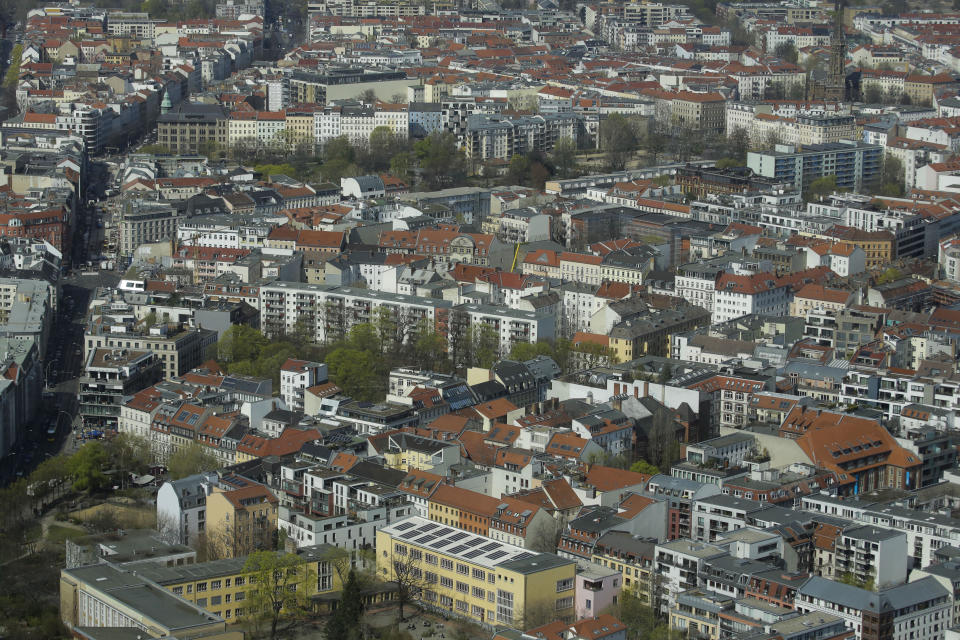 FILE - In this Thursday, April 4, 2019, file photo, apartment buildings in the district Mitte photographed from the television tower in Berlin, Germany. Germany’s highest court has ruled that a cap on rent prices implemented last year by Berlin’s left-wing state government is unconstitutional and void. (AP Photo/Markus Schreiber, file)