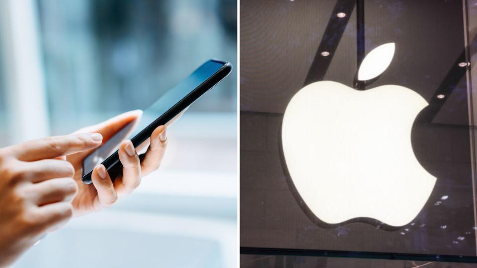 Close up of hands holding iPhone. Apple logo in white. 