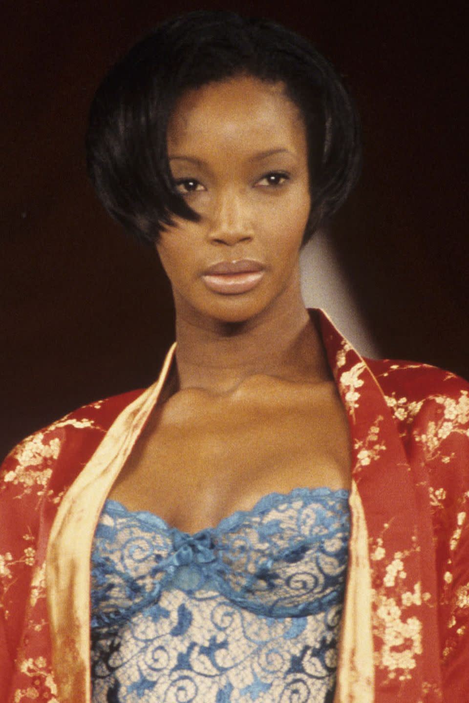 <p>Beverly Peele wearing her signature pixie cut and a shiny nude lip on the 1995 runway.</p>