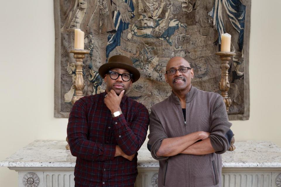 This Dec. 26, 2013 photo shows Bishop Paul Morton, right, and his son PJ Morton in New Orleans. The Mortons are nominated for best gospel album for “Best Days Yet,” the elder Morton’s album where PJ wrote and produced four songs. PJ’s song, the Stevie Wonder-featured “Only One,” is also up for best R&B song. The Mortons are the first to accomplish the feat since Bob and Jakob Dylan did so in 1998. (AP Photo/Doug Parker)