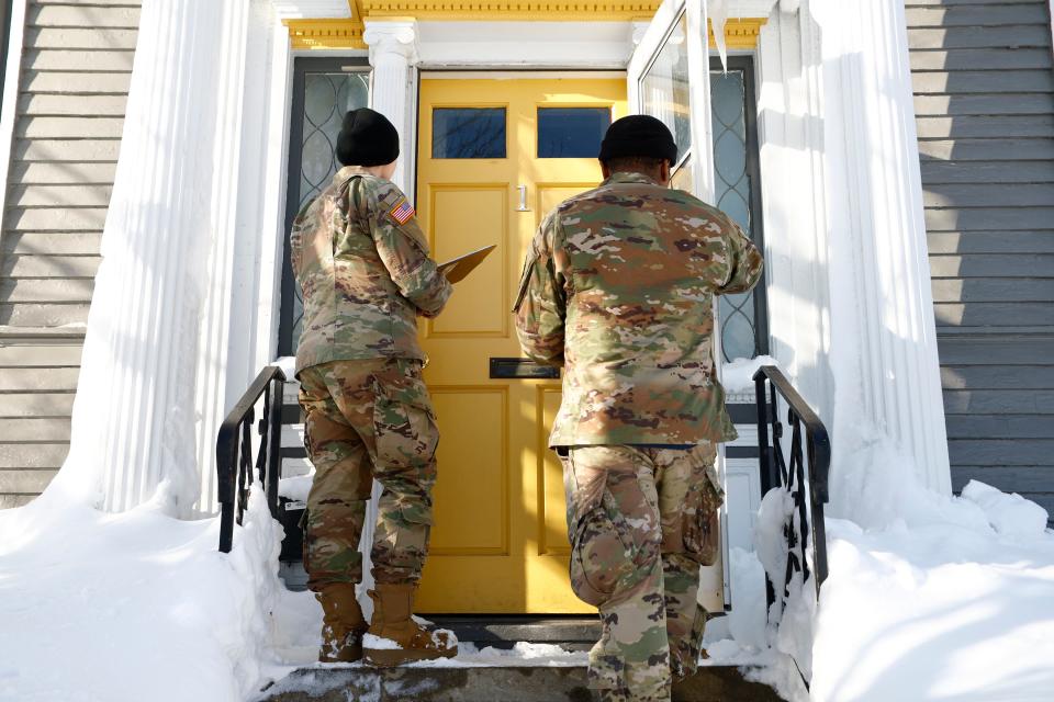 National Guard members check on residents in Buffalo N.Y., after a severe winter storm overwhelmed the city.