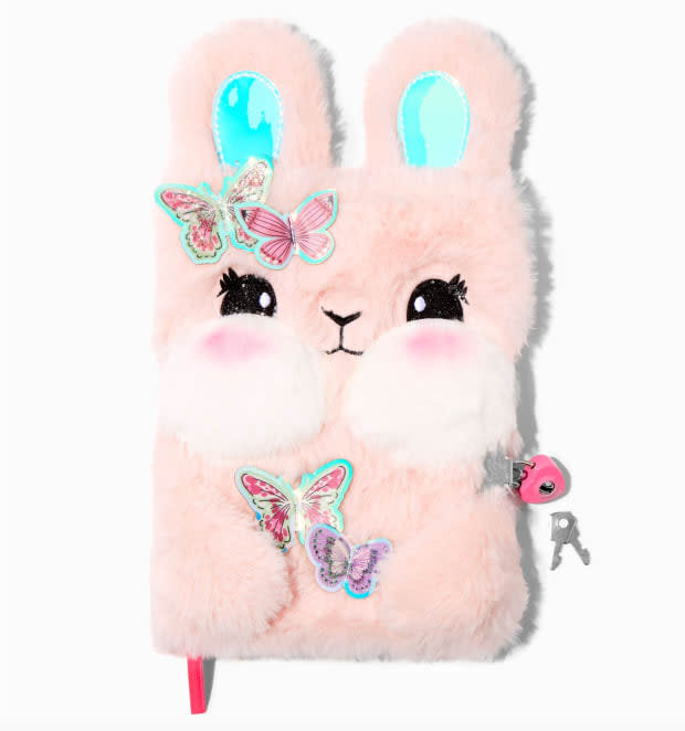 <p>When you combine a plushie with a journal, you've got the perfect Easter gift for a teenager. With its 3D iridescent ears, this journal comes with two keys and a lock! Your teenager will love to jot down ideas and thoughts and lock them away.</p><p><em><a href="https://go.skimresources.com?id=113896X1572730&xs=1&url=https%3A%2F%2Fwww.claires.com%2Fus%2Fbutterfly-bunny-pink-plush-lock-diary-155447.html&sref=parade.com%2Fshopping%2Feaster-gifts-teens" rel="noopener" target="_blank" data-ylk="slk:Butterfly Bunny Pink Plush Lock Diary, Original Price $24.99, Now $14.99 at Claire's;elm:context_link;itc:0;sec:content-canvas" class="link ">Butterfly Bunny Pink Plush Lock Diary, Original Price $24.99, Now $14.99 at Claire's </a></em></p><p>Claire's</p>