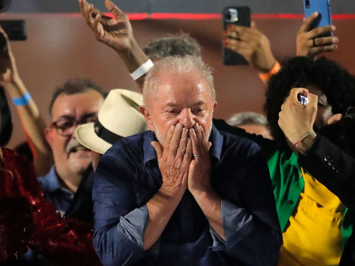 Brazilian president-elect for the leftist Workers Party Luiz Inacio Lula da Silva  greets supporters in Sao Paulo after defeating Jair Bolsonaro (AFP/Getty)