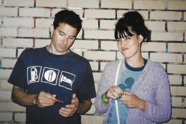 <p>Kathi Wilcox </p> Adam Horovitz and Kathleen Hanna on tour