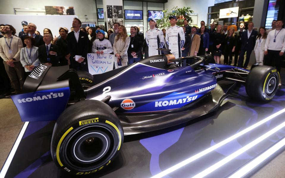 Williams Racing Formula 1 F1 drivers Alex Albon and Logan Sargeant pose for a photo next to the Williams FW46 car during the presentation and launch event ahead of the 2024 F1 season at New York City.