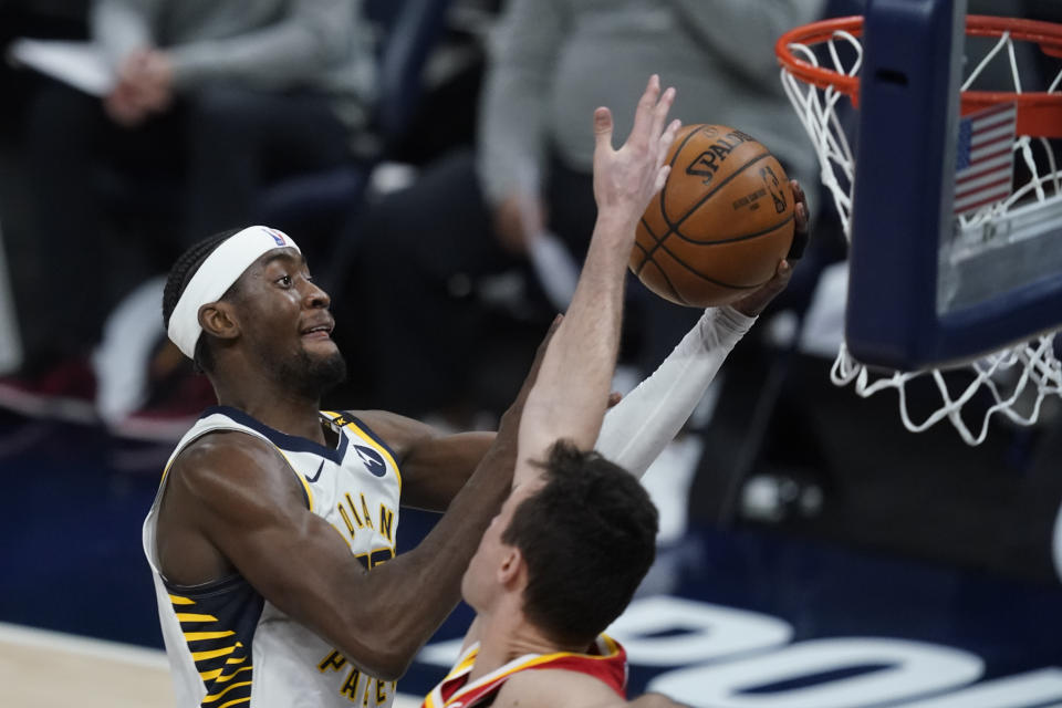 Indiana Pacers' Caris LeVert shoots against Atlanta Hawks' Danilo Gallinari during the second half of an NBA basketball game Thursday, May 6, 2021, in Indianapolis. (AP Photo/Darron Cummings)