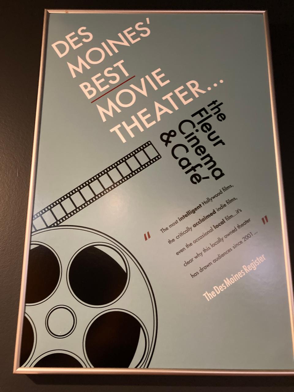 Hanging on the wall at the Fleur Cinema & Café is a laudatory quote from the Des Moines Register.