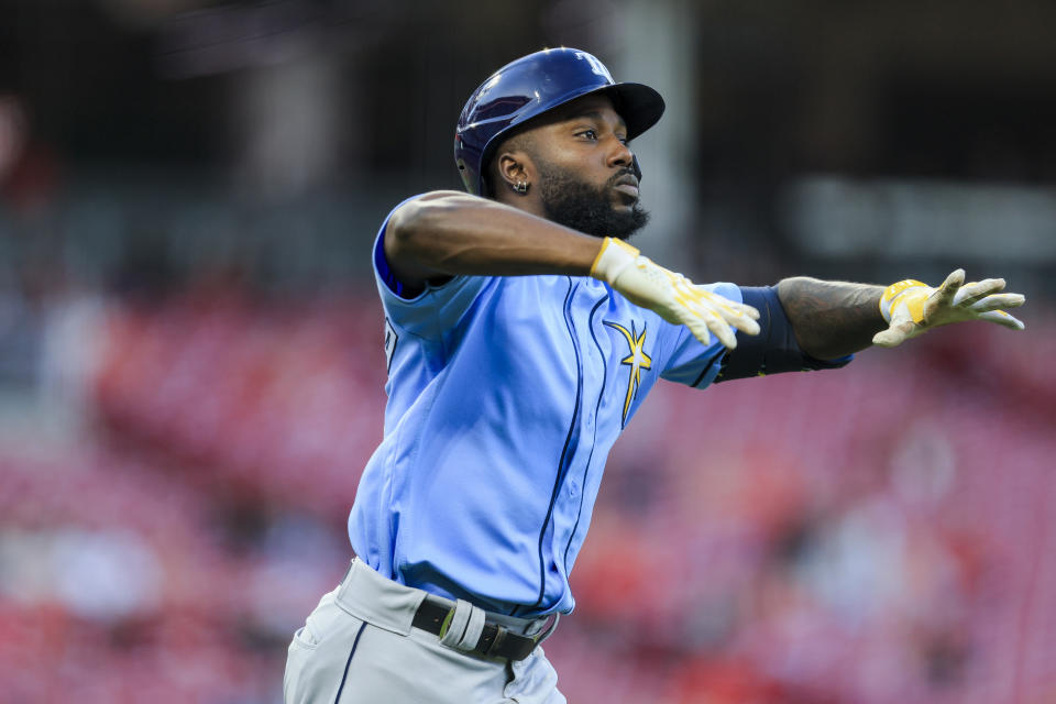 Tampa Bay Rays' Wander Franco gestures as runs the bases on a solo home run during the fourth inning of the team's baseball game against the Cincinnati Reds in Cincinnati, Tuesday, April 18, 2023. (AP Photo/Aaron Doster)