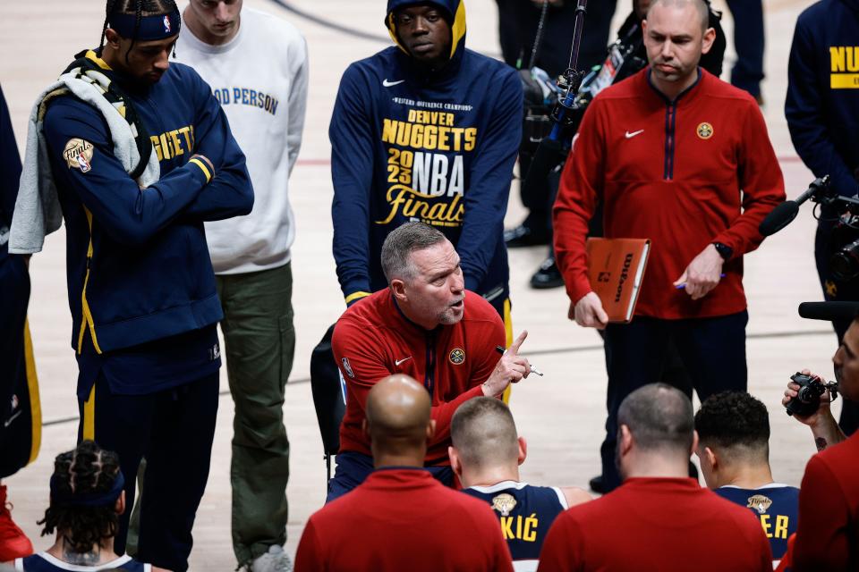Denver Nuggets head coach Michael Malone addresses his team during Game 2 of the NBA Finals.