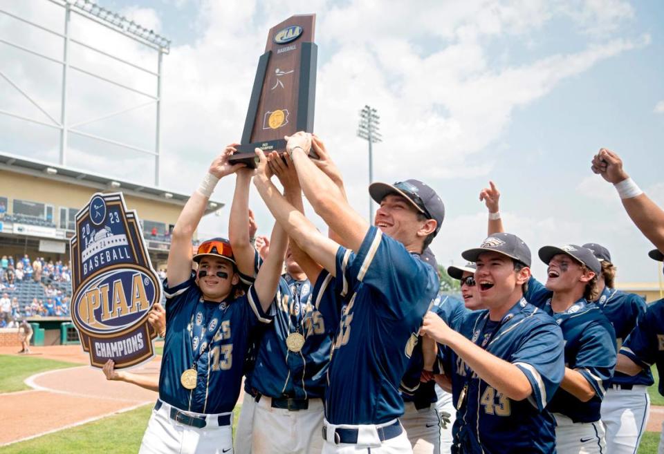 Bald Eagle Area baseball holds up the PIAA Class 2A trophy after the 11-0 win over Mount Union at Medlar Field on Saturday, June 17, 2023.