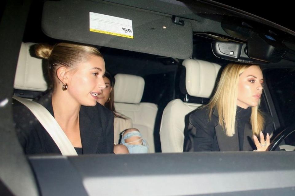 Hailey Bieber and Madison Beer leaving the restaurant | BACKGRID