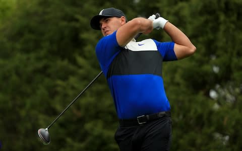 Brooks Koepka drives on the 11th hole - Credit: Getty Images North America