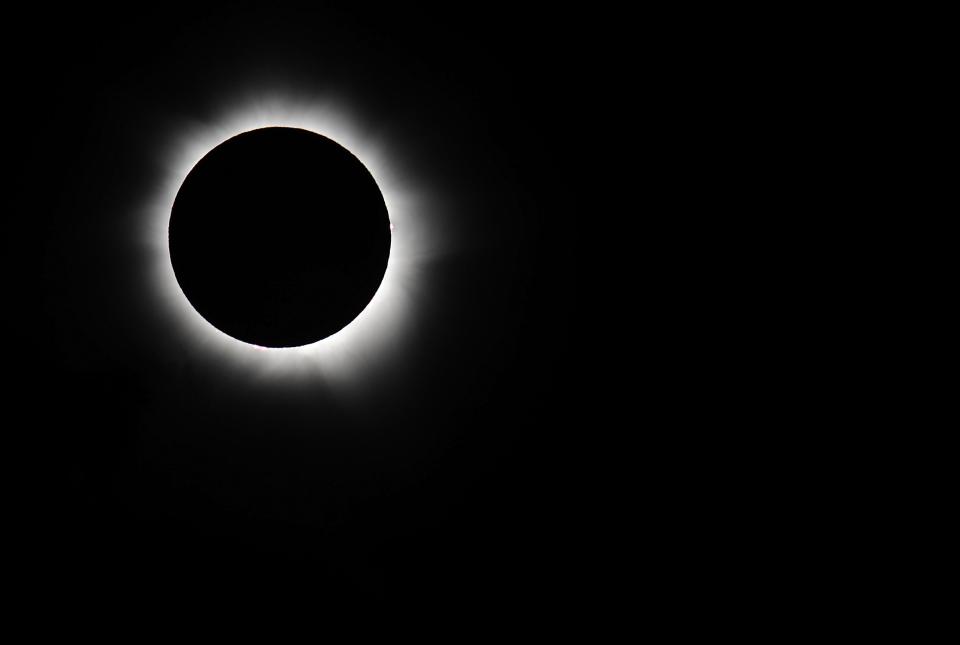 PALM COVE, AUSTRALIA - NOVEMBER 14: Totality is seen during the solar eclipse at Palm Cove on November 14, 2012 in Palm Cove, Australia. Thousands of eclipse-watchers have gathered in part of North Queensland to enjoy the solar eclipse, the first in Australia in a decade. (Photo by Ian Hitchcock/Getty Images)