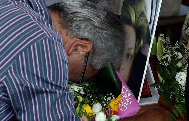 Heartbroken and stunned relatives mourn victims. Photos: AP