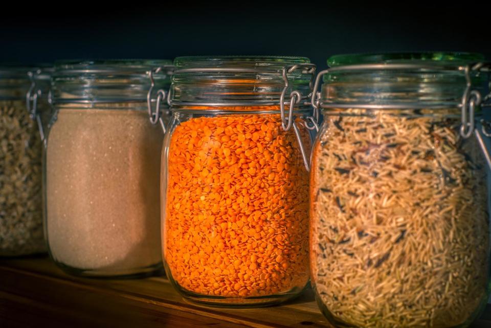 Transfer grains to airtight containers