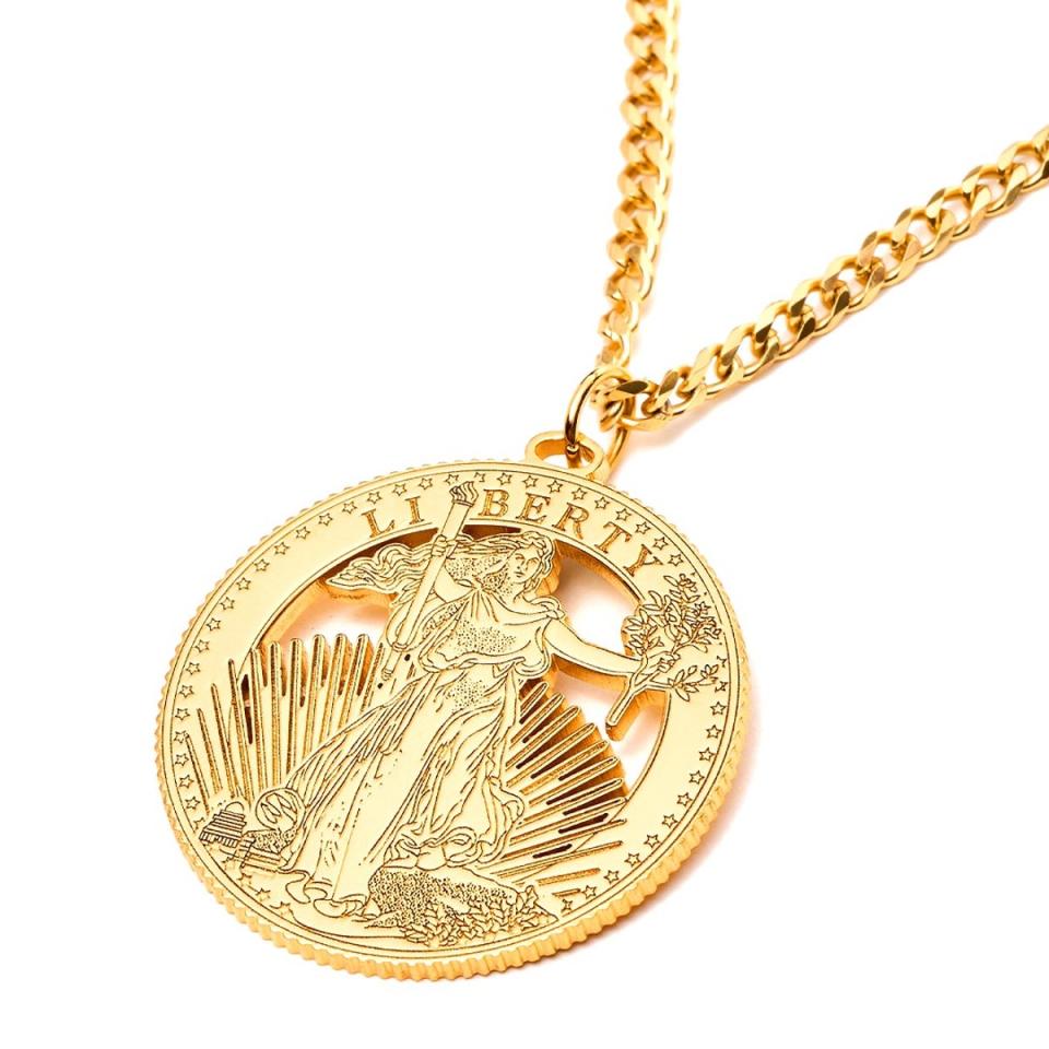 The necklace, available for $600, features an engraving of Lady Liberty (screenshot/melaniatrump.com)