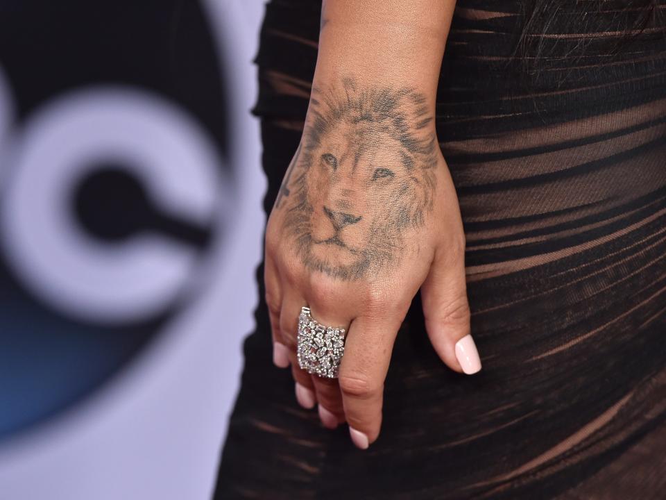 demi lovato lion tattoo