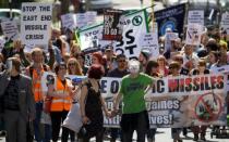 Residents protest against government plans to station surface-to-air missiles on the roof of their rented flats near London's Olympic Park in June 2012. London residents on Tuesday lost their court battle to prevent the government placing surface-to-air missiles on the roof of their apartment block during the Olympics