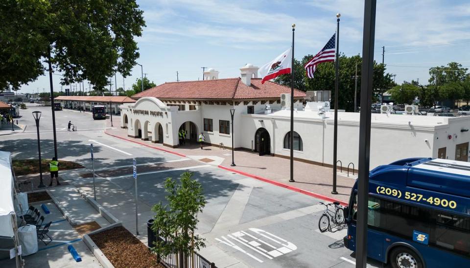 A bus enters the station at the newly renovated Modesto Transit Center in Modesto, Calif., Thursday, June 15, 2023. At its heart is a 1915 depot built by Southern Pacific Railroad, which had passenger service until 1971.
